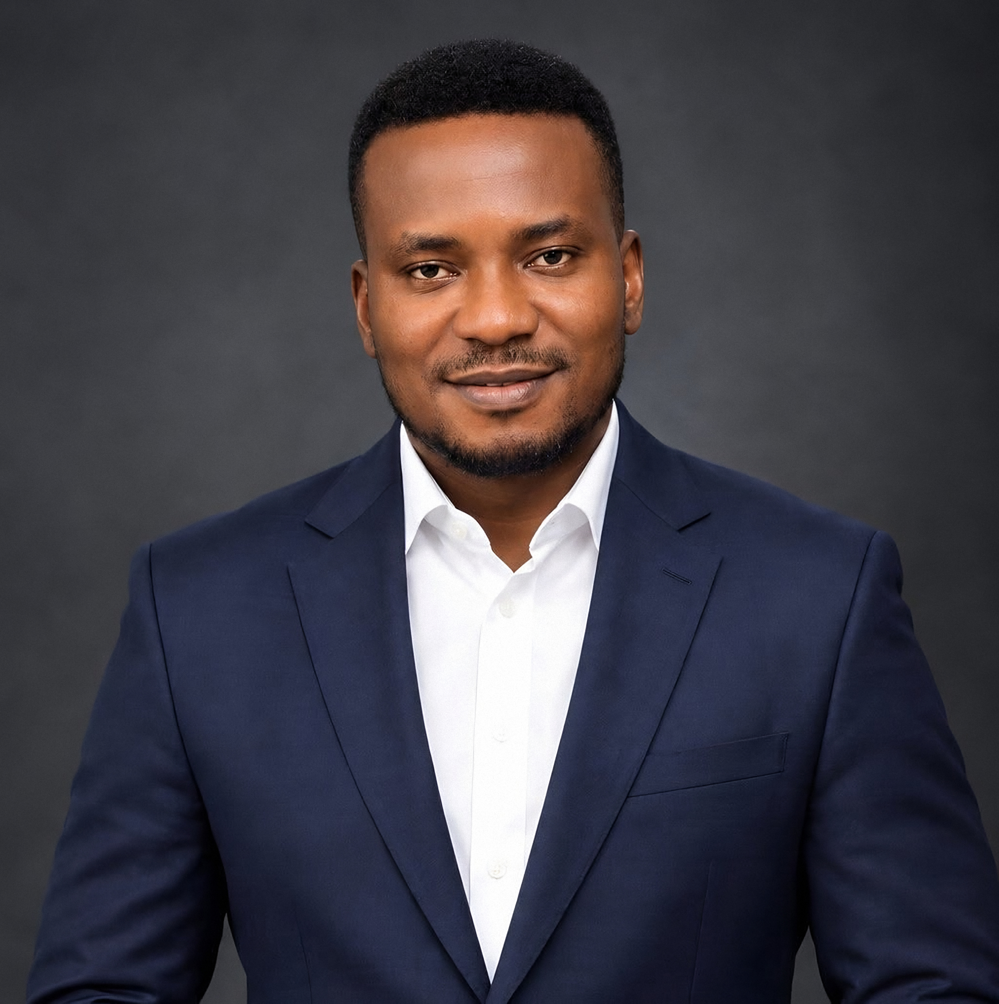 Amb. John Ifeanyi Amos official executive portrait